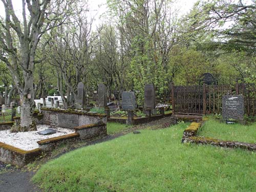 Inside the cemetry, outside the cache...